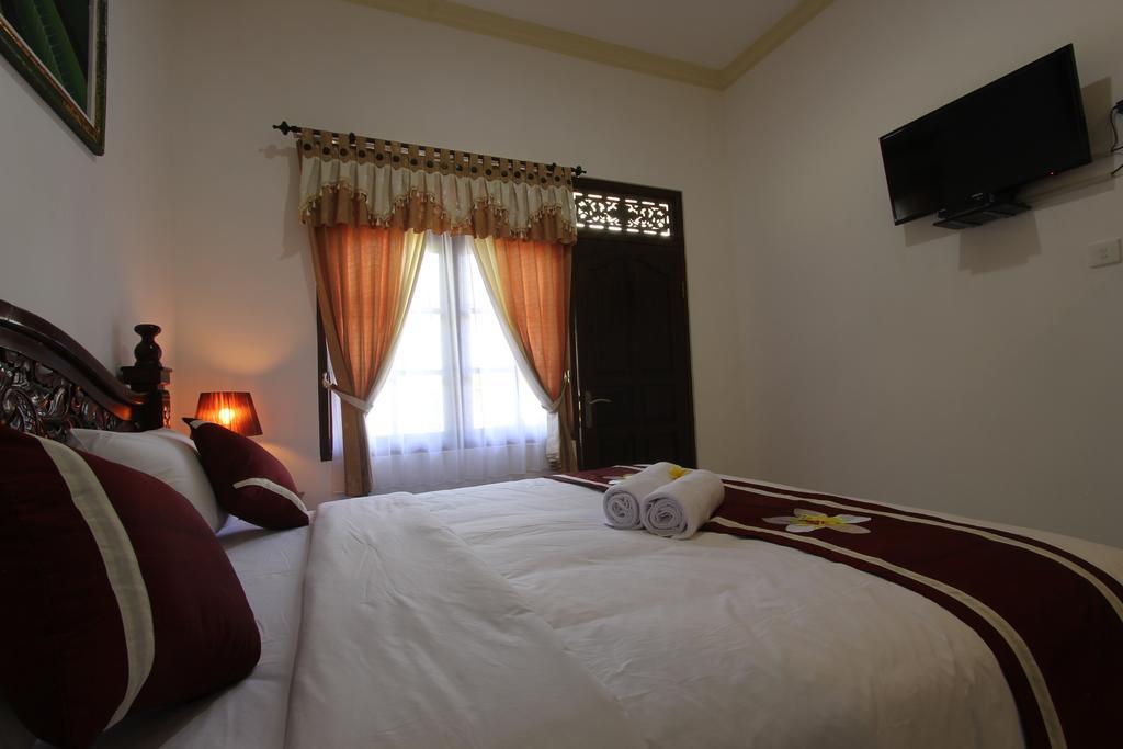 Frangipani Homestay Нуса Дуа Екстериор снимка