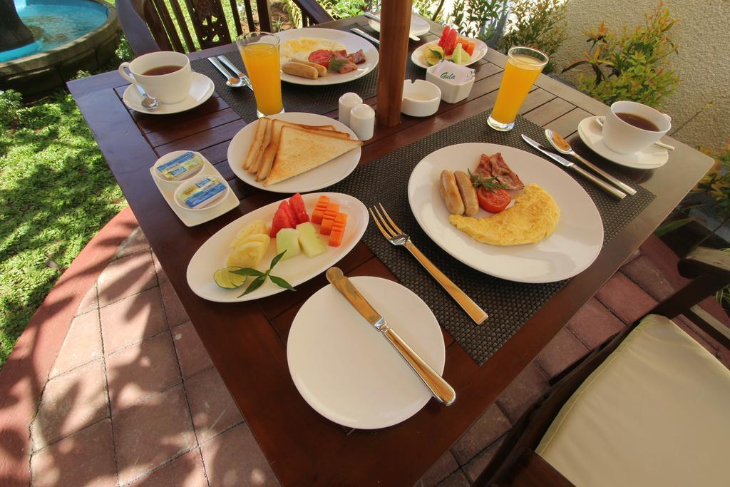 Frangipani Homestay Нуса Дуа Екстериор снимка