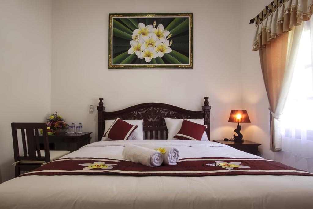 Frangipani Homestay Нуса Дуа Стая снимка